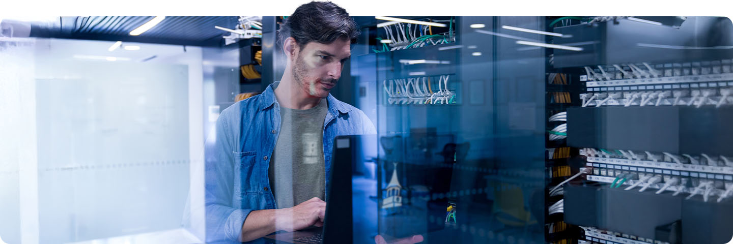 Man working in computer room.