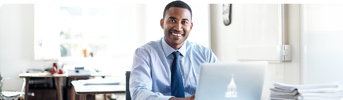 Male professional working on his laptop.