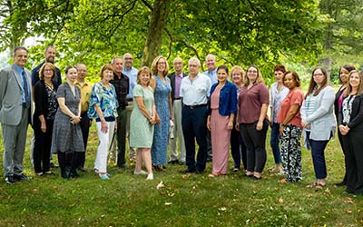 Woman smiling and clapping