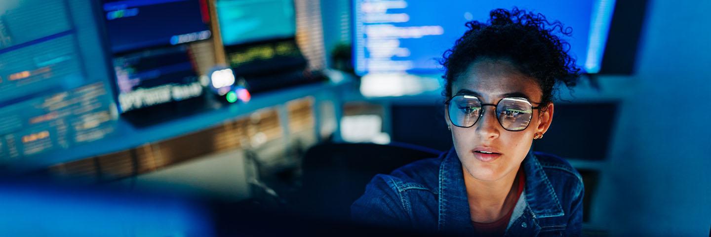 Data Science student studying data on a computer